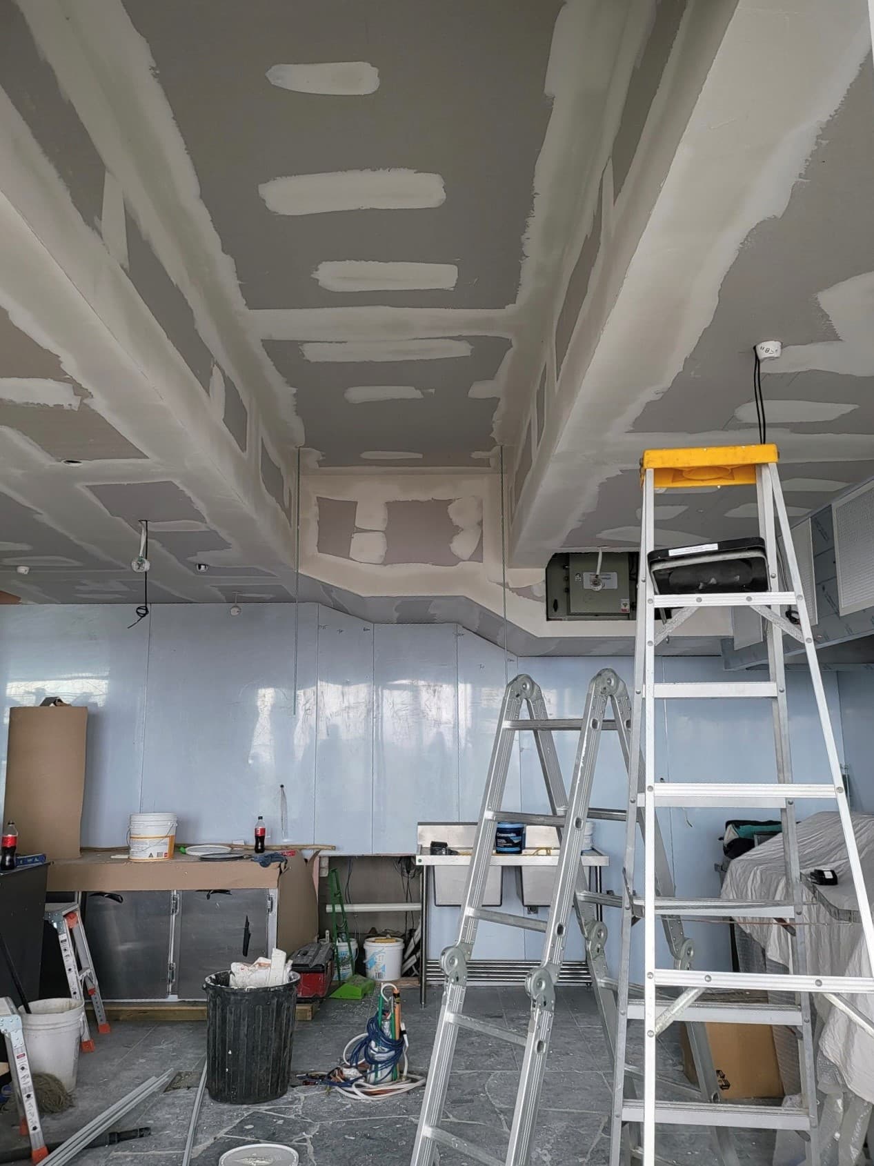 Ceiling sheeted and being set