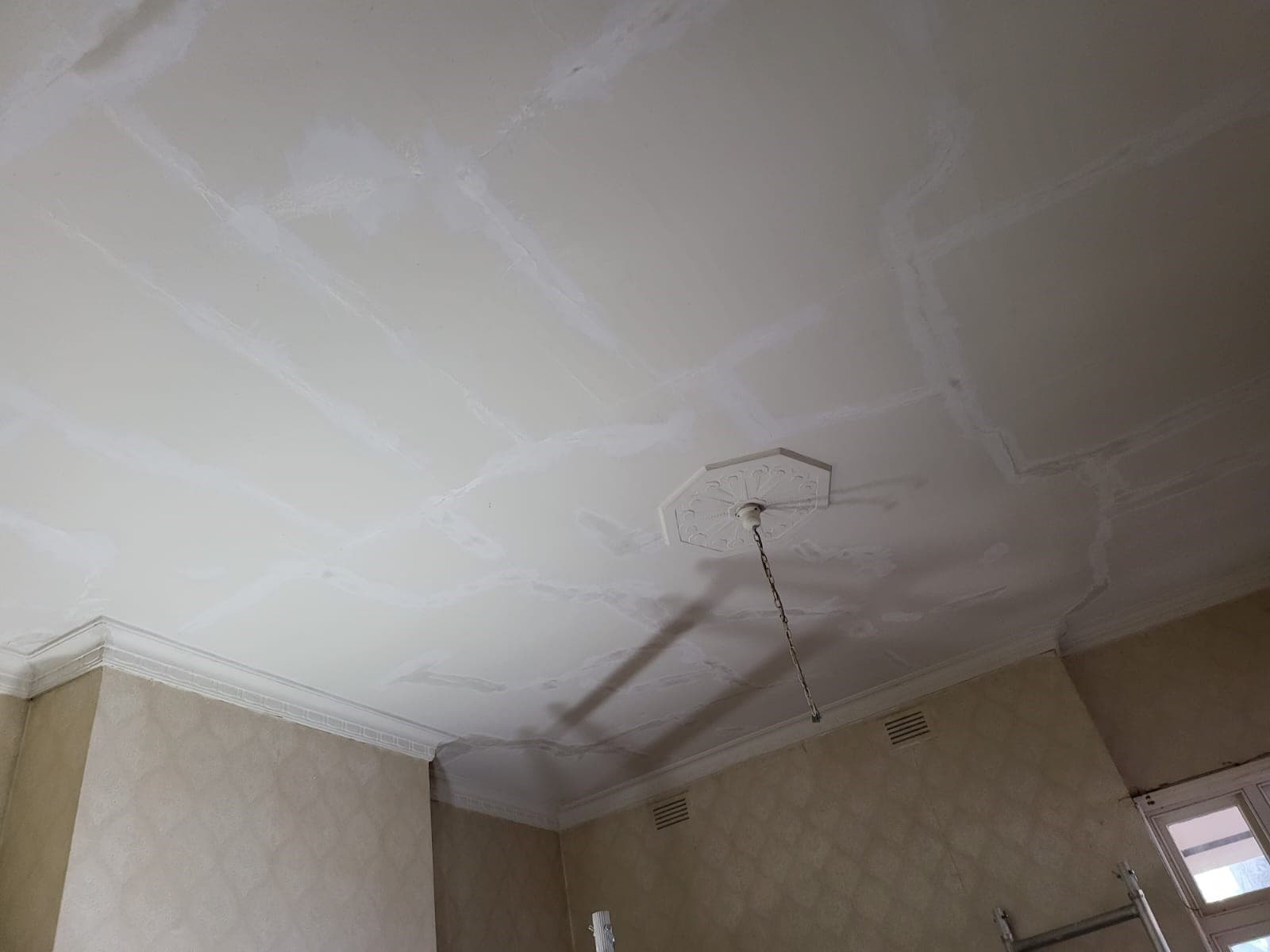 Ceiling replastered with new cornice